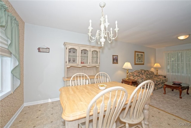 12 Sparrowbush Rd S, S, NY 12110 - dining room featuring a chandelier, baseboards, and light tile patterned flooring