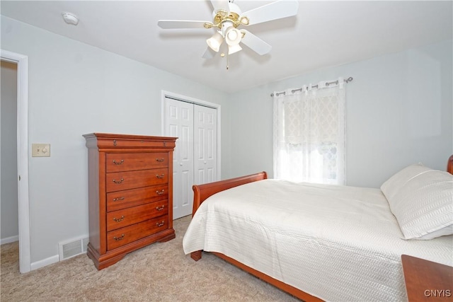 12 Sparrowbush Rd S, S, NY 12110 - bedroom with a closet, light carpet, baseboards, and a ceiling fan