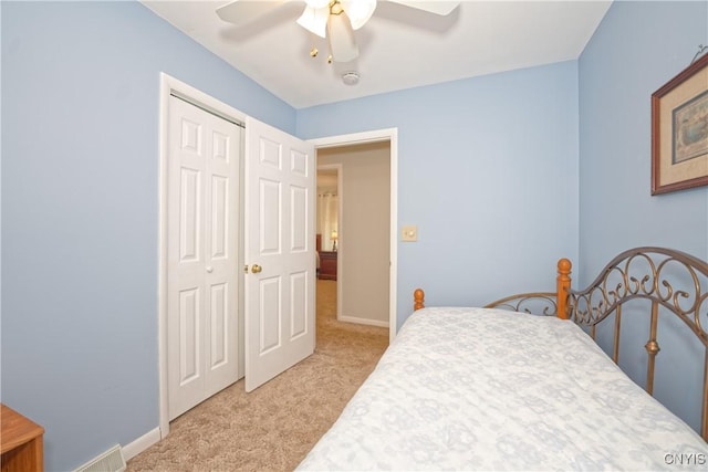 12 Sparrowbush Rd S, S, NY 12110 - bedroom with light colored carpet, a closet, a ceiling fan, and baseboards
