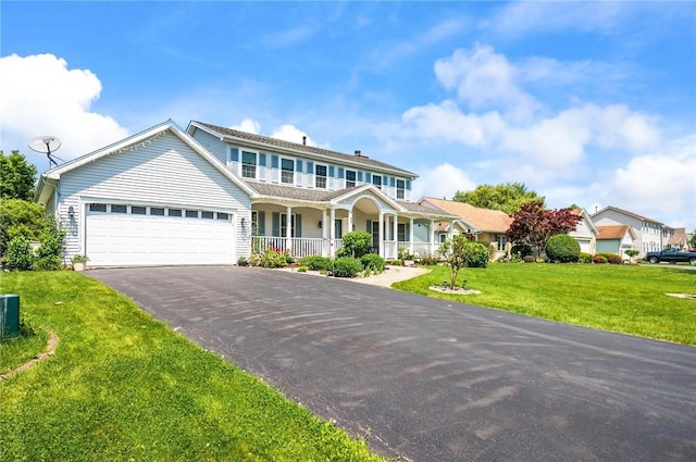53 Toni Ter, Chili, NY 14624 - view of front facade featuring a porch, driveway, an attached garage, and a front lawn