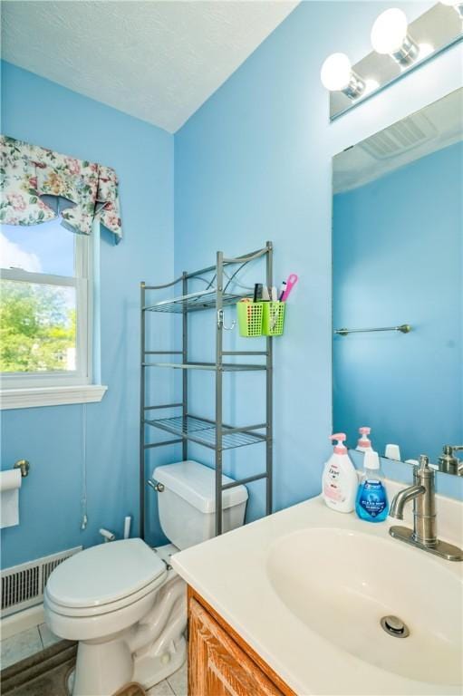 53 Toni Ter, Chili, NY 14624 - half bathroom featuring vanity and tile patterned flooring