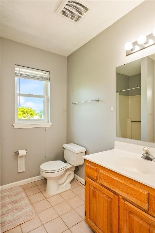 53 Toni Ter, Chili, NY 14624 - full bath featuring tile patterned floors, vanity, and a shower