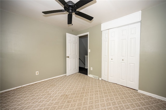 30 Sibley Dr, West Seneca, NY 14224 - unfurnished bedroom featuring light carpet, baseboards, a closet, and a ceiling fan