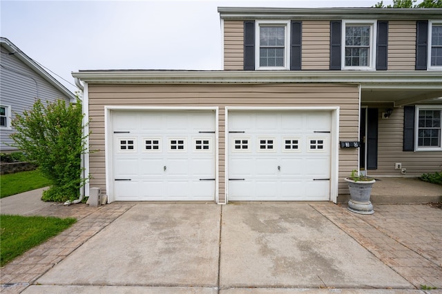 30 Sibley Dr, West Seneca, NY 14224 - garage featuring concrete driveway