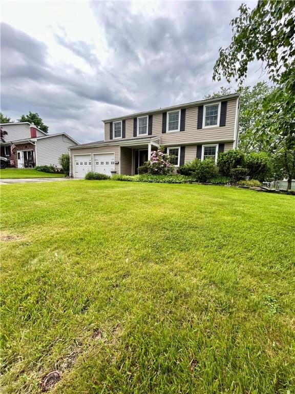 30 Sibley Dr, West Seneca, NY 14224 - view of front of property featuring a front yard, an attached garage, and driveway