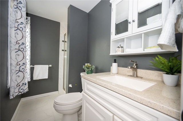 30 Sibley Dr, West Seneca, NY 14224 - full bathroom with marble look tiles, vanity, toilet, a shower stall, and baseboards