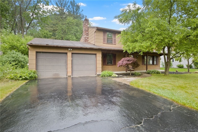 69 Tree Brook Dr, Penfield, NY 14625 - view of front facade featuring a garage, a chimney, a front lawn, and asphalt driveway