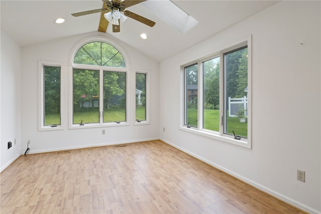 69 Tree Brook Dr, Penfield, NY 14625 - empty room with plenty of natural light, light wood finished floors, lofted ceiling, and recessed lighting