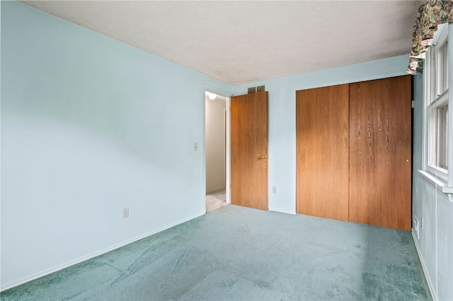 69 Tree Brook Dr, Penfield, NY 14625 - unfurnished bedroom featuring carpet floors and baseboards