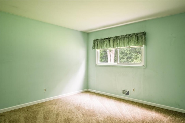 176 Wildbriar Rd, Henrietta, NY 14623 - spare room featuring carpet and baseboards