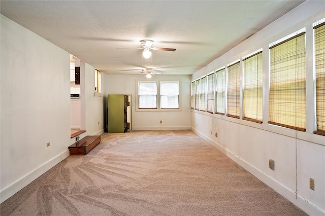 176 Wildbriar Rd, Henrietta, NY 14623 - empty room with a ceiling fan, light colored carpet, and baseboards