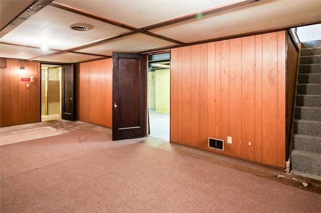 176 Wildbriar Rd, Henrietta, NY 14623 - finished below grade area with stairs, carpet floors, and wooden walls