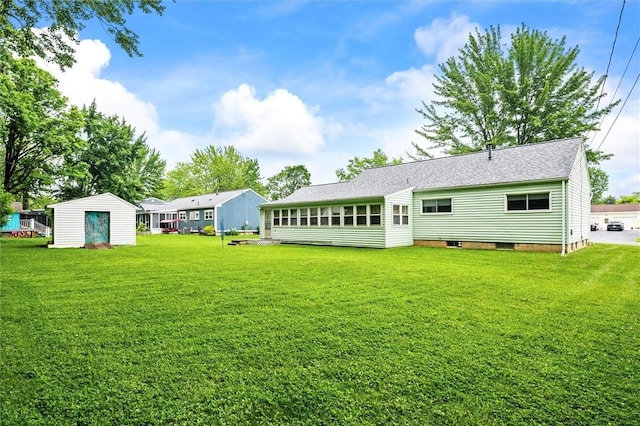 176 Wildbriar Rd, Henrietta, NY 14623 - rear view of property with a yard and a shingled roof