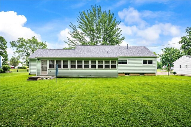 176 Wildbriar Rd, Henrietta, NY 14623 - rear view of property featuring a lawn