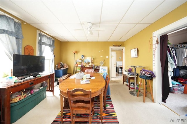 132 Weiss St, Buffalo, NY 14206 - dining room featuring ceiling fan, a paneled ceiling, and carpet