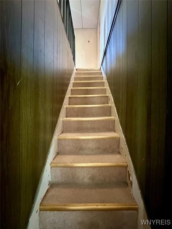 11920 Clarence Center Rd, Newstead, NY 14001 - staircase with wooden walls