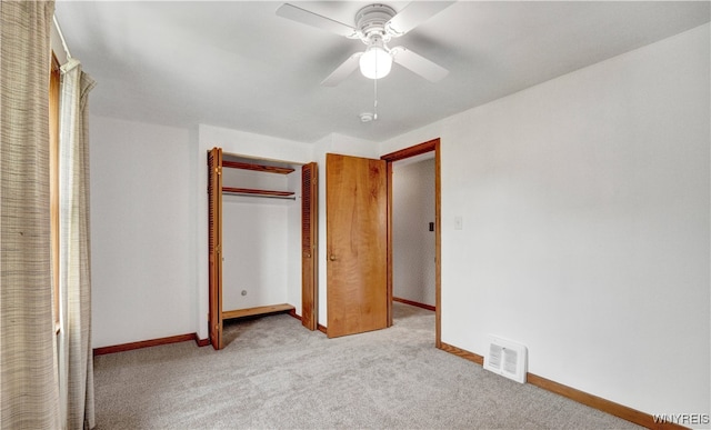 63 Princeton Ct, Cheektowaga, NY 14225 - unfurnished bedroom with baseboards, carpet, a closet, and a ceiling fan