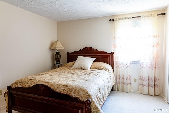 18 Tree Top Dr, Penfield, NY 14625 - bedroom featuring light colored carpet, a textured ceiling, and baseboards