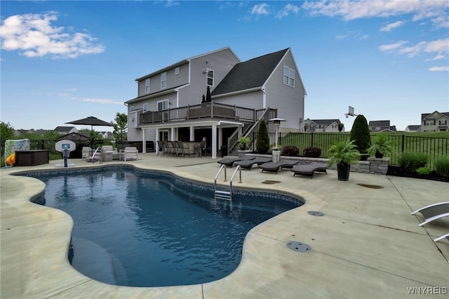 392 Quarry Run, Grand Island, NY 14072 - view of swimming pool with a patio area, a fenced backyard, a deck, outdoor dining space, and stairway