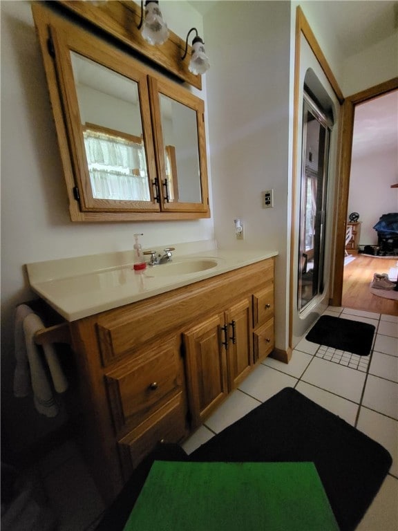 104 Mcclure Dr, Sanford, NY 13754 - bathroom with vanity and tile patterned flooring