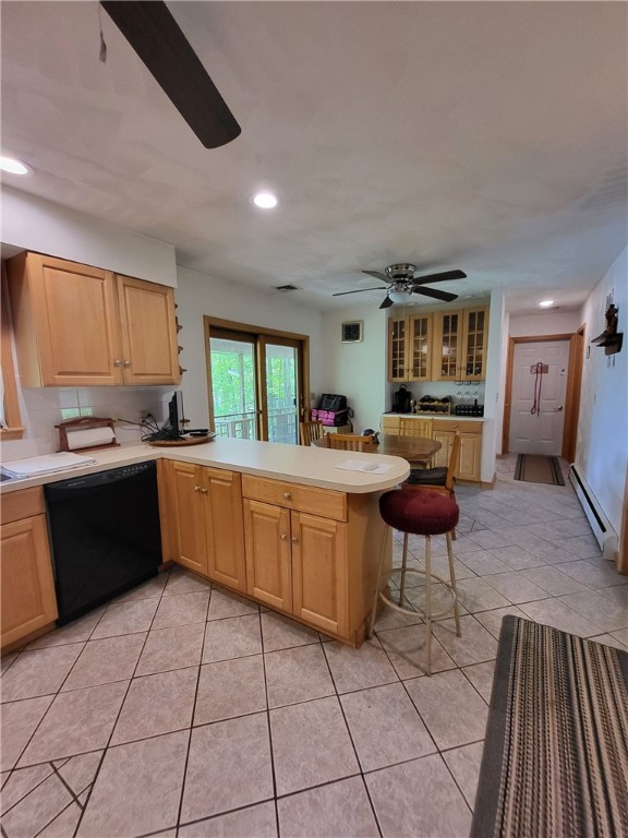 104 Mcclure Dr, Sanford, NY 13754 - kitchen with dishwasher, light brown cabinetry, ceiling fan, baseboard heating, and recessed lighting