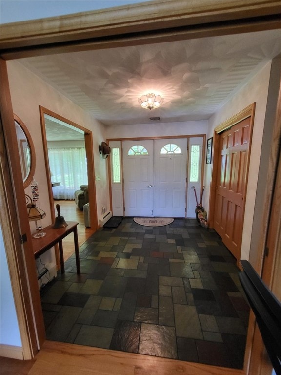 104 Mcclure Dr, Sanford, NY 13754 - entryway with dark stone finish floors