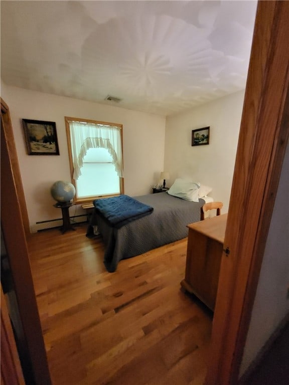 104 Mcclure Dr, Sanford, NY 13754 - bedroom featuring wood finished floors