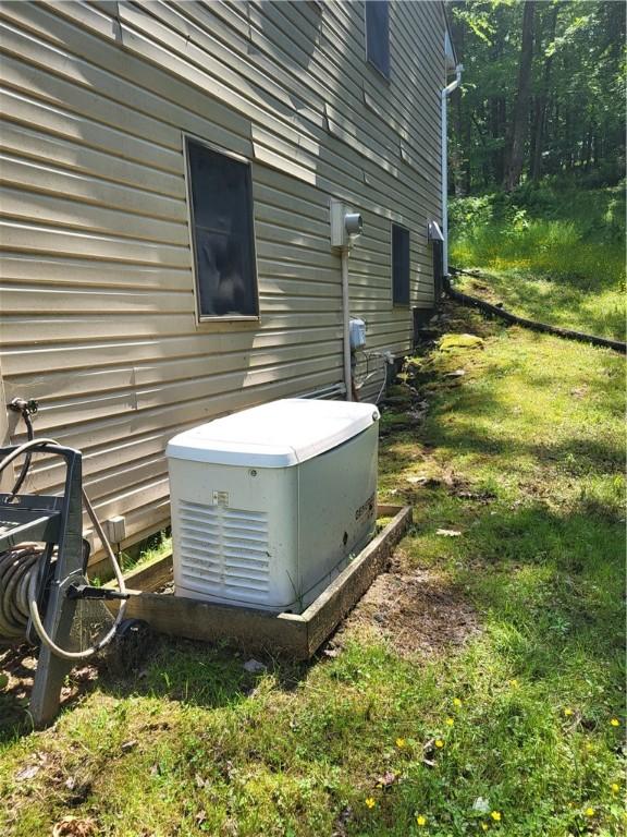 104 Mcclure Dr, Sanford, NY 13754 - exterior view of a power unit and electric meter