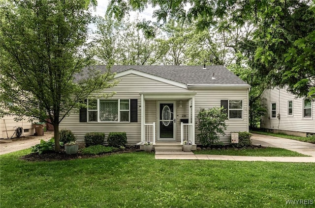 236 Commodore Ter, Cheektowaga, NY 14225 - view of front facade featuring a front yard and a shingled roof