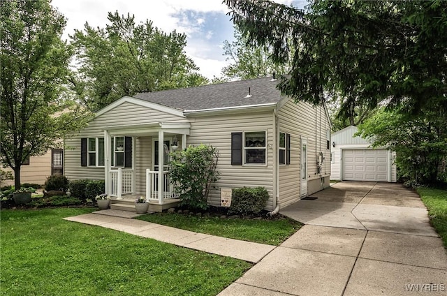 236 Commodore Ter, Cheektowaga, NY 14225 - view of front of property featuring an outdoor structure, a front yard, concrete driveway, a garage, and a shingled roof