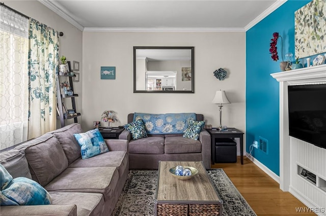 236 Commodore Ter, Cheektowaga, NY 14225 - living room featuring ornamental molding, wood finished floors, and baseboards