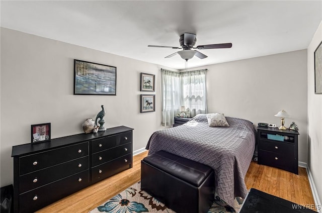 236 Commodore Ter, Cheektowaga, NY 14225 - bedroom with wood finished floors, a ceiling fan, and baseboards