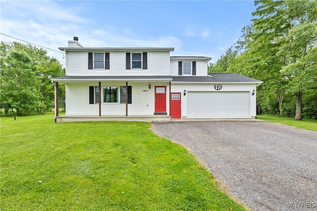 1621 Cain Rd, Brant, NY 14111 - traditional home featuring an attached garage, covered porch, asphalt driveway, and a front lawn
