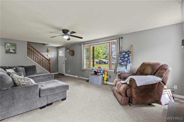 1621 Cain Rd, Brant, NY 14111 - living area with stairway, ceiling fan, carpet flooring, and baseboards