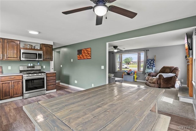 1621 Cain Rd, Brant, NY 14111 - kitchen featuring appliances with stainless steel finishes, a ceiling fan, light countertops, and wood finished floors