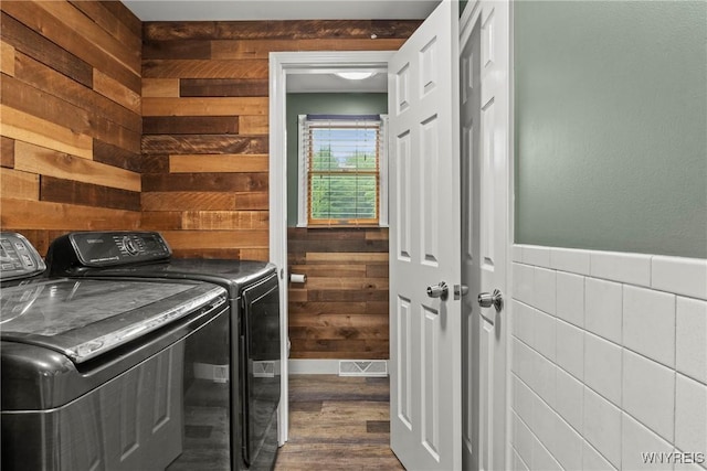 1621 Cain Rd, Brant, NY 14111 - laundry area with washer and clothes dryer, dark wood-style floors, a wainscoted wall, and wooden walls