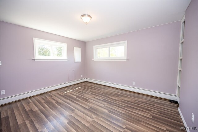 6817 Revere Dr, Evans, NY 14047 - spare room featuring a baseboard radiator and wood finished floors