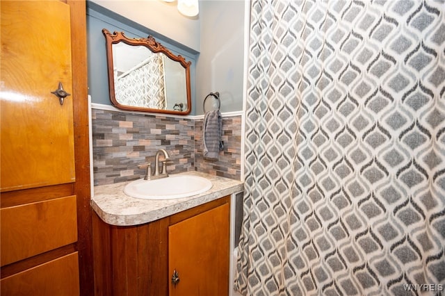 6817 Revere Dr, Evans, NY 14047 - bathroom with vanity, a shower with curtain, and wainscoting