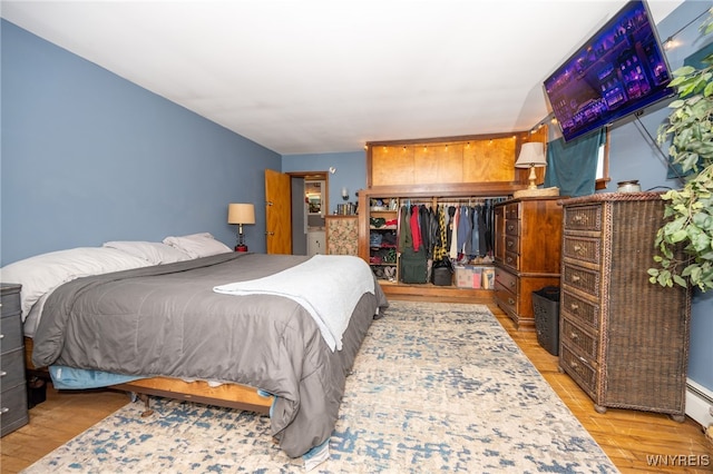 6817 Revere Dr, Evans, NY 14047 - bedroom featuring a closet and wood finished floors