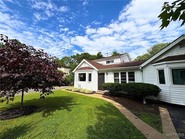 6817 Revere Dr, Evans, NY 14047 - view of front of property featuring a front yard
