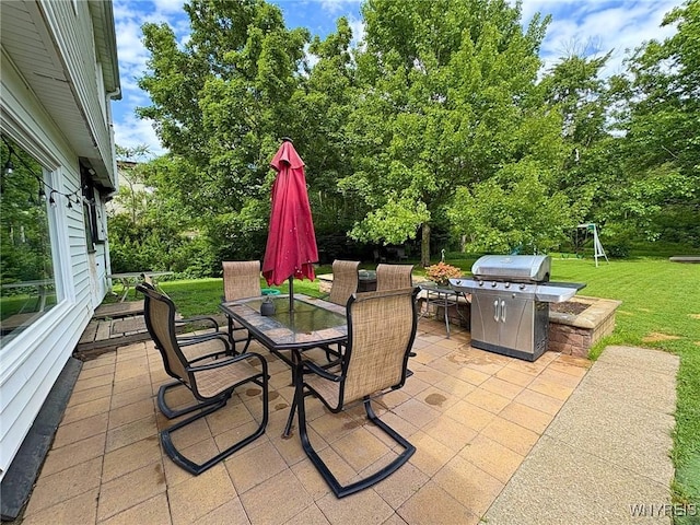6817 Revere Dr, Evans, NY 14047 - view of patio / terrace featuring outdoor dining space, a grill, and view of scattered trees