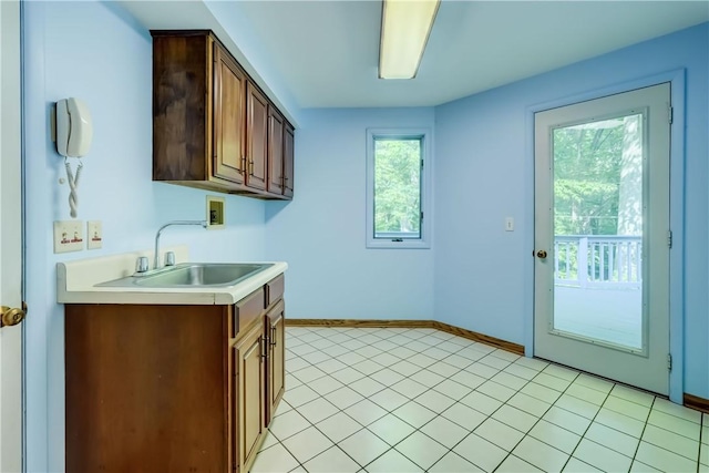 120 Scotch Ln, Irondequoit, NY 14617 - washroom with washer hookup, cabinet space, and baseboards