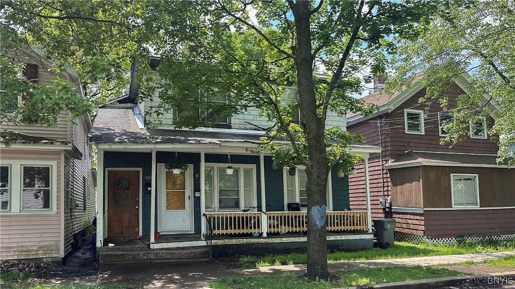305 Ann St, Rome-Inside, NY 13440 - view of front of home featuring covered porch