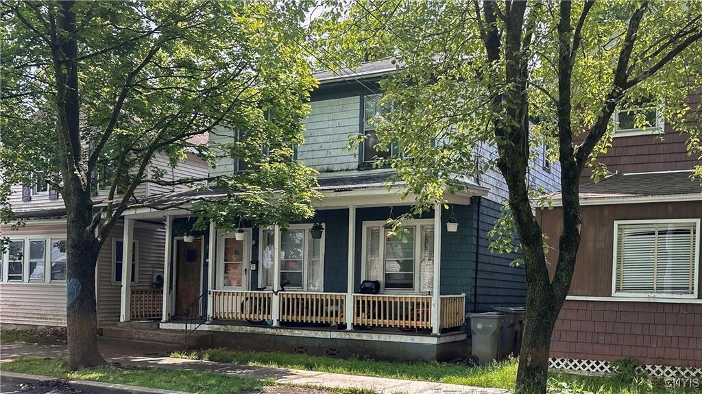 305 Ann St, Rome-Inside, NY 13440 - view of front facade with a porch