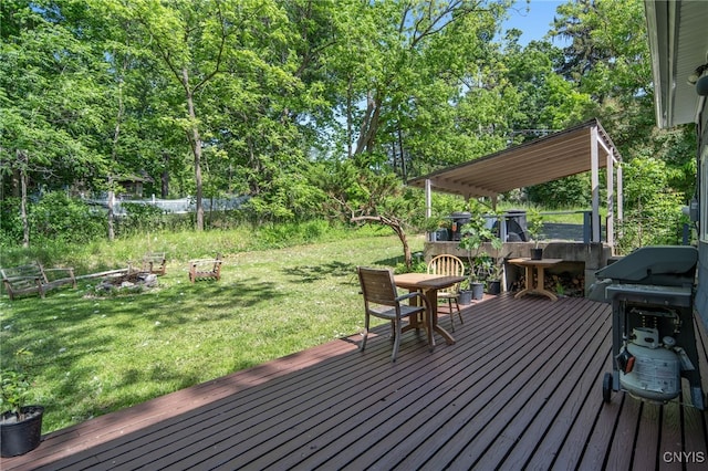 435 Elm St, Ithaca City, NY 14850 - wooden terrace featuring a lawn, outdoor dining area, and view of scattered trees
