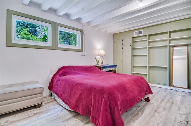 435 Elm St, Ithaca City, NY 14850 - bedroom featuring beamed ceiling and wood finished floors