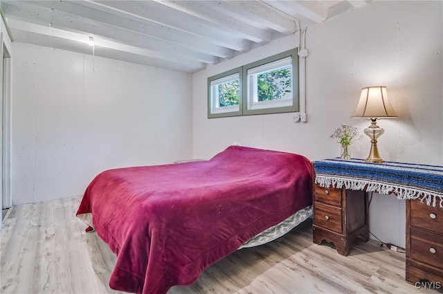 435 Elm St, Ithaca City, NY 14850 - bedroom with wood finished floors and beam ceiling