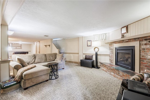 654 Lake Shore Blvd, Irondequoit, NY 14617 - living room with a brick fireplace, carpet flooring, stairway, and baseboards