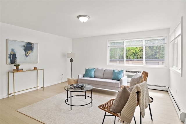 406 Westage At The Hbr, Irondequoit, NY 14617 - living room featuring wood finished floors, baseboard heating, and a wall mounted air conditioner
