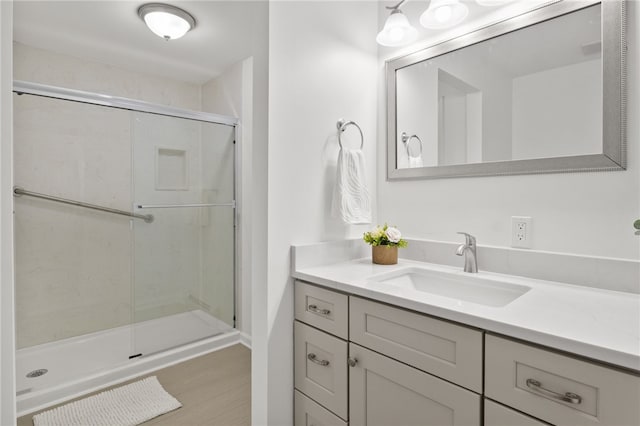406 Westage At The Hbr, Irondequoit, NY 14617 - bathroom featuring vanity, a stall shower, and wood finished floors